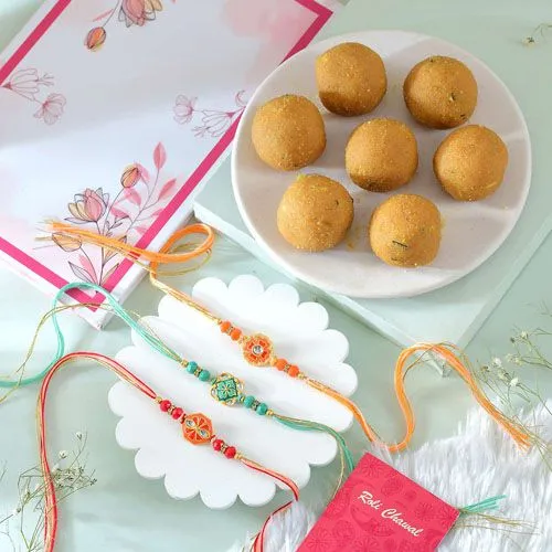 Floral Rakhi Trio with Besan Laddoo