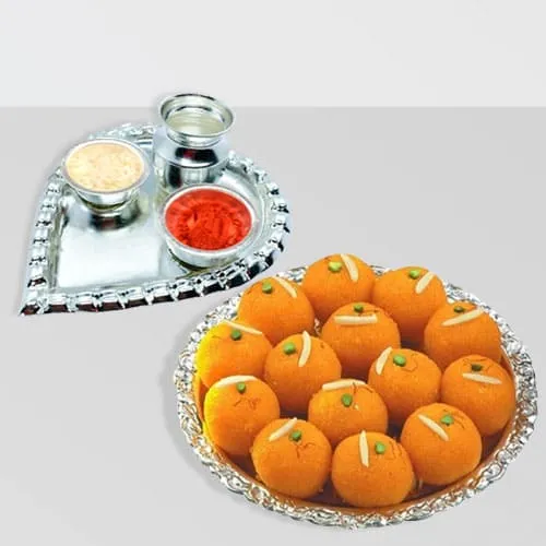 Get Silver Plated Paan Shaped Puja Aarti Thali (weight 52 gm) with Motichur Laddu from Haldiram