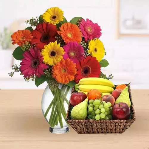Send Combo of Fresh Fruits Basket with Gerberas in a Vase
