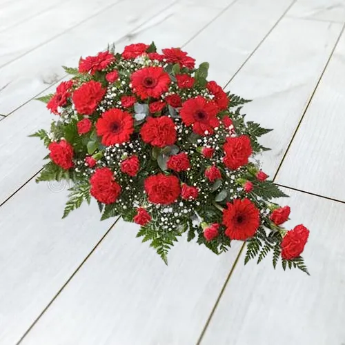 Sending Flat Arrangement of Red Flowers