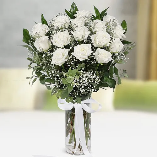 Sending White Roses in a Glass Vase