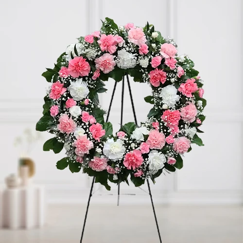 Sending Sympathy Wreath of Roses and Carnations 