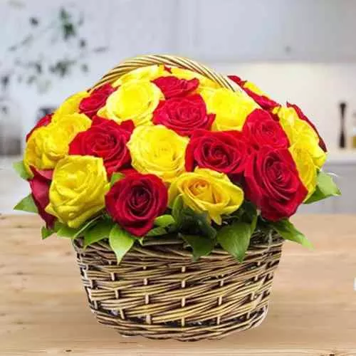 Deliver Vibrant Yellow and Red Roses in Basket