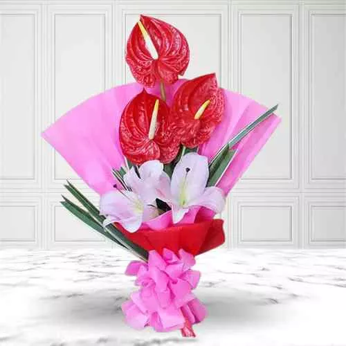 Shop Marvelous Red Anthurium n Pink Lilies Bouquet