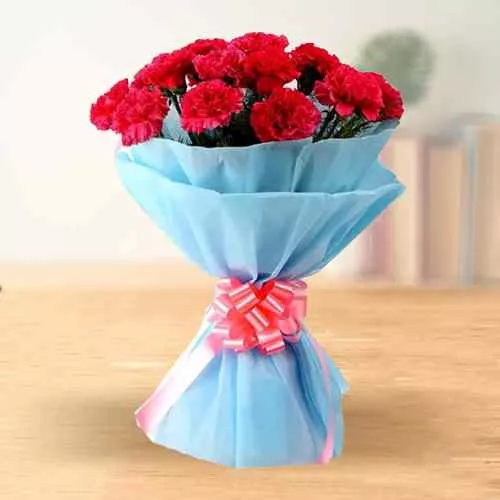 Shop for Hand Bunch of Pink Carnations Online in tissue wrapping