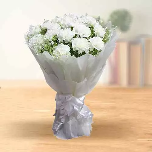 Order Hand Bouquet of White Carnations in a tissue wrap