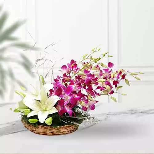 Sending Basket Arrangement of White Lilies and Orchids