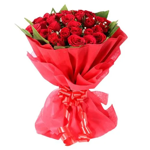 Sending Red Color Roses artfully wrapped in Tissue