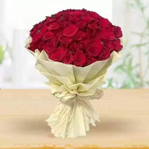 Shop for Red Rose Bouquet in Tissue Wrap 