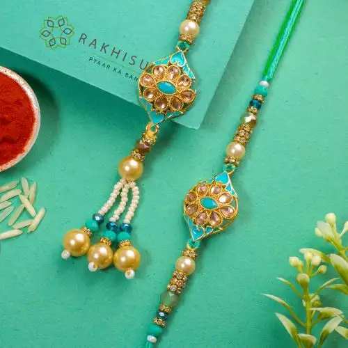 Trendy Kundan Bhaiya Bhabhi Rakhi Set