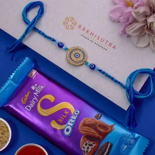 Stunning Evil Eye Rakhi N Cadbury Silk Treat