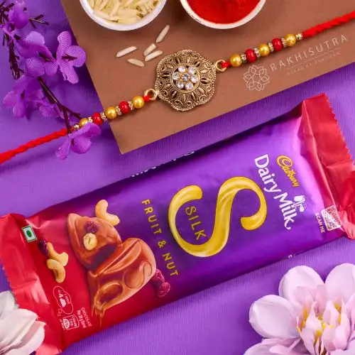 Beautiful Kundan Rakhi N Cadbury Fruit n Nut Duo