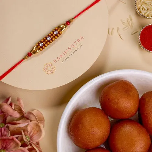 Stunning AD Rakhi N Gulab Jamun Treat