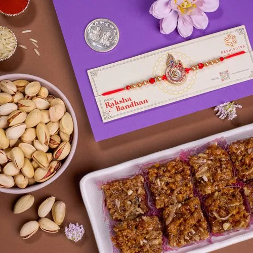 Magnificent Rakhi with Dodha Barfi  N  Pistachio Gift